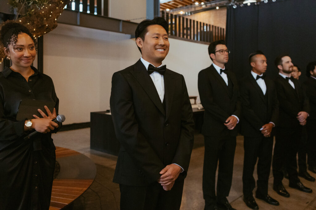 San Diego Wedding photographer photographs couples ceremony at the downtown industrial venue 808. 