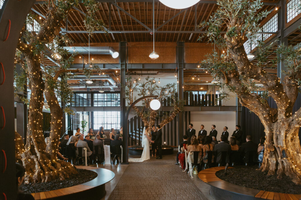San Diego Wedding photographer photographs couples ceremony at the downtown industrial venue 808. 