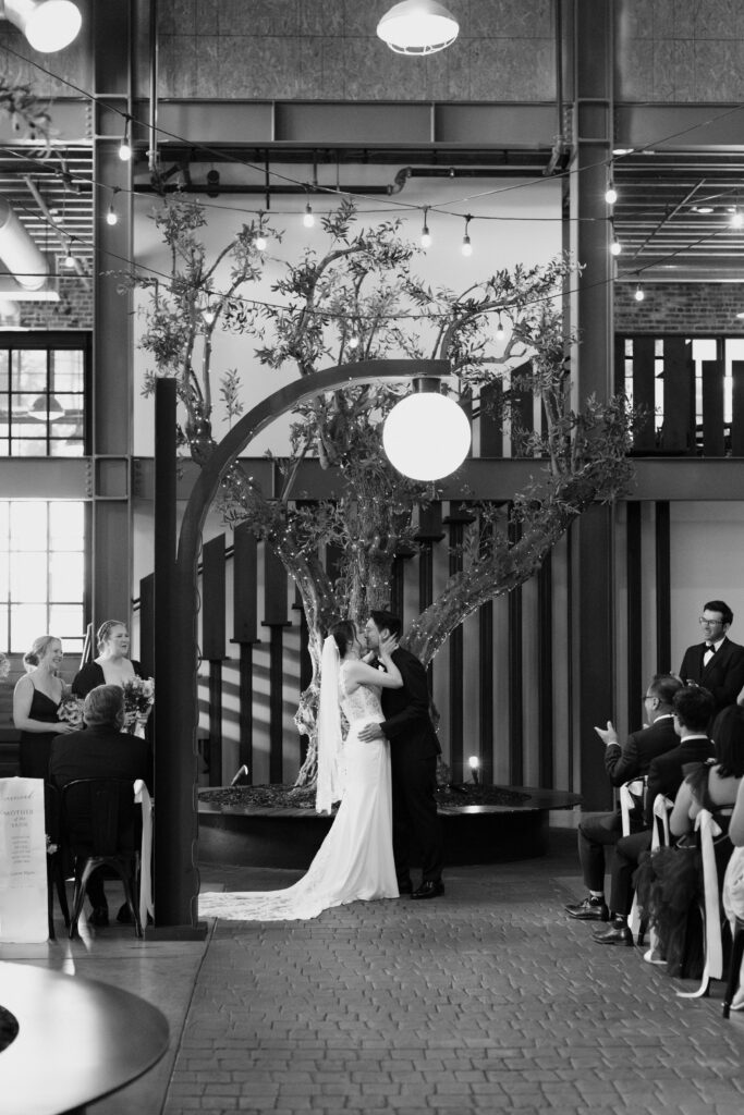 San Diego Wedding photographer photographs couples ceremony at the downtown industrial venue 808. 