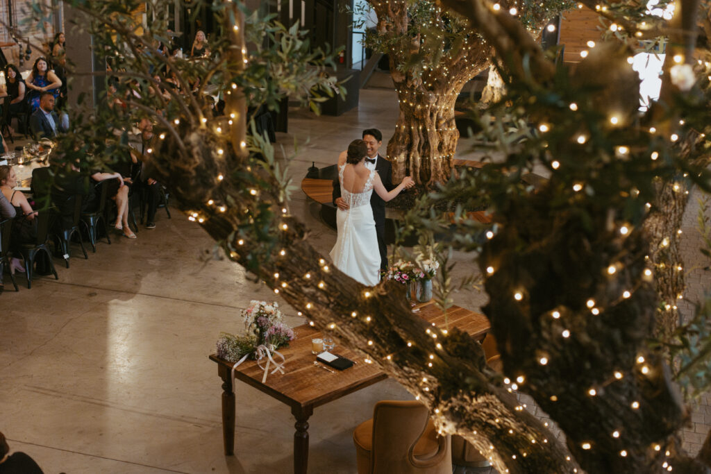 San Diego Wedding photographer photographs couples ceremony at the downtown industrial venue 808. 