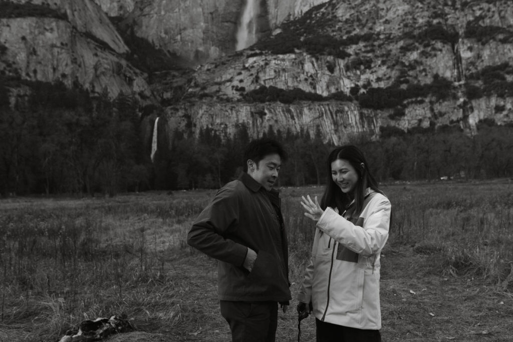 Intimate Yosemite engagement photos in Cooks Meadow after surprise proposal with winter light in Yosemite Valley.
