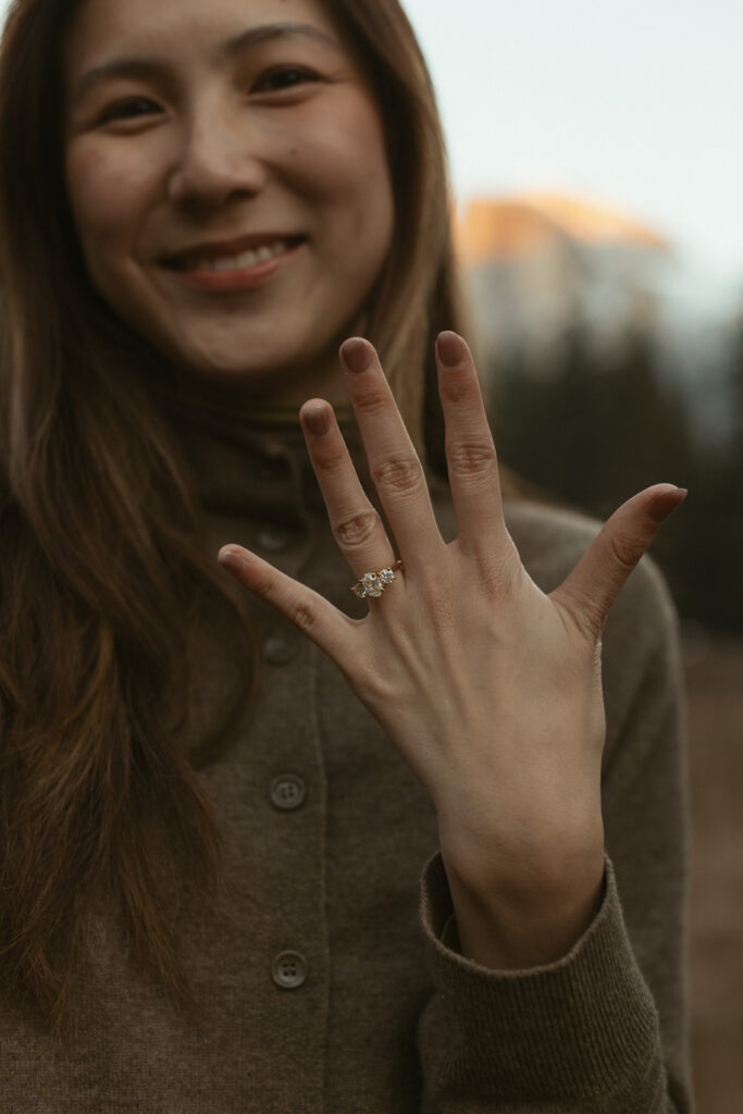 Intimate Yosemite engagement photos in Cooks Meadow after surprise proposal with winter light in Yosemite Valley.