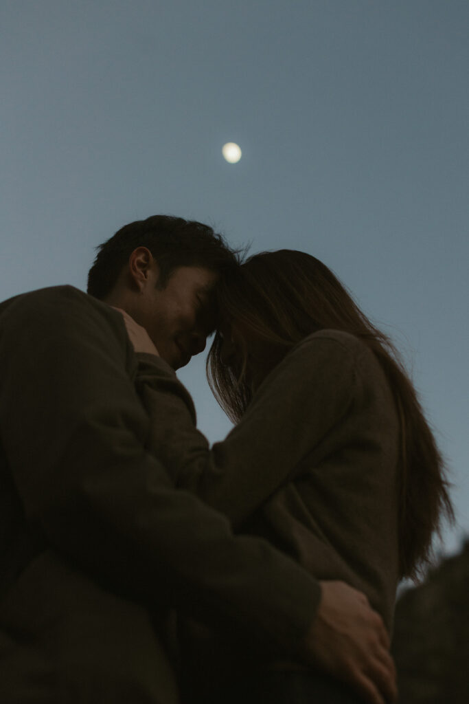 Intimate Yosemite engagement photos in Cooks Meadow after surprise proposal with winter light in Yosemite Valley.