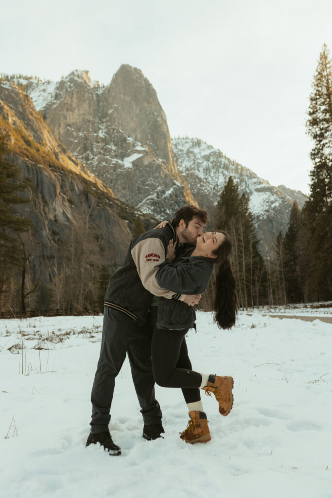 Yosemite Engagament Photographer takes couples portraits in Cooks meadow 