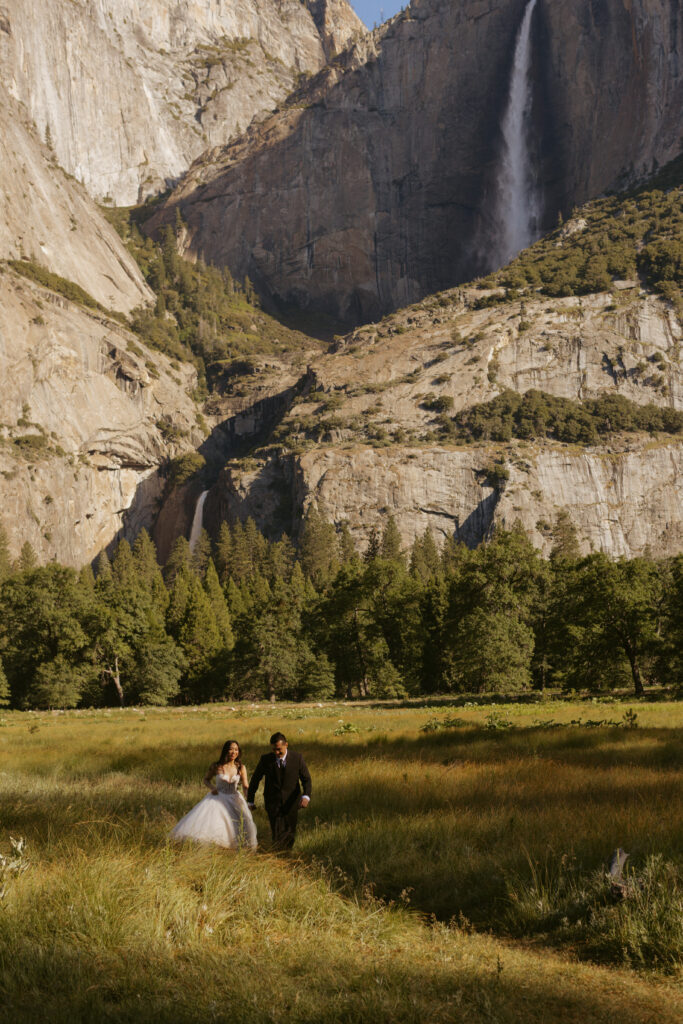 Yosemite falls waterfall in the background os couples wedding portraits 