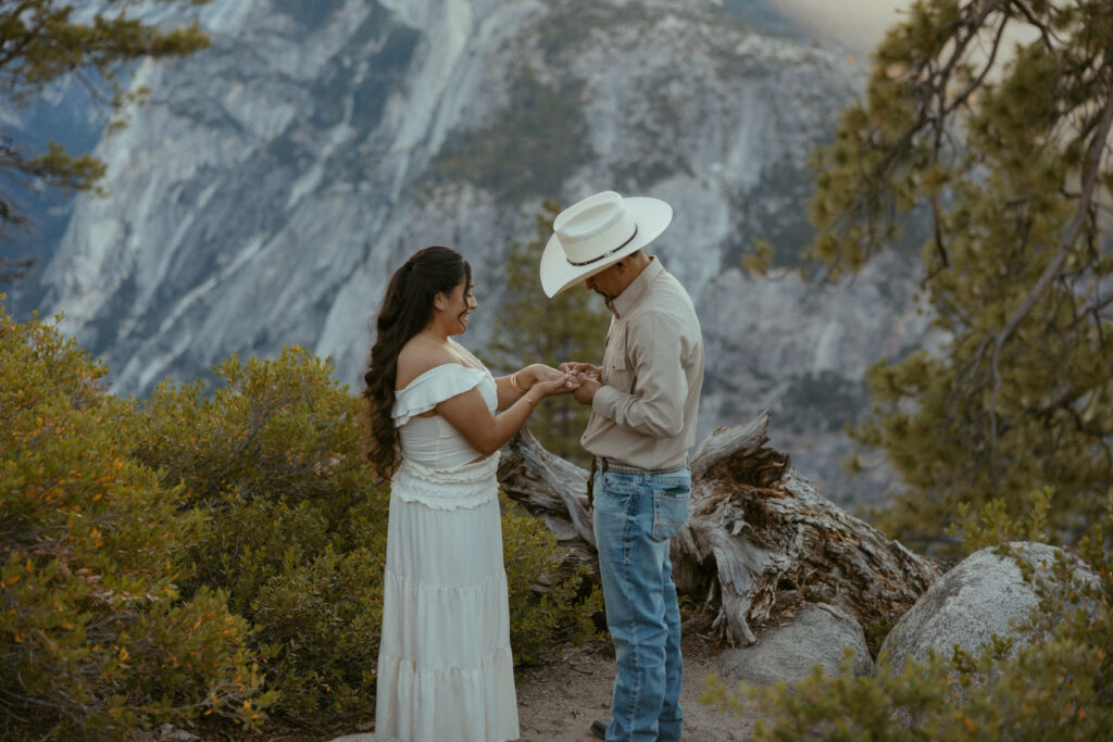 Showing each other the Proposal Ring at a national Park 